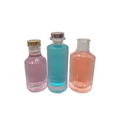 High quality debossed 100ml 150ml cheap crystal glass alcohol bottles with cork bulk