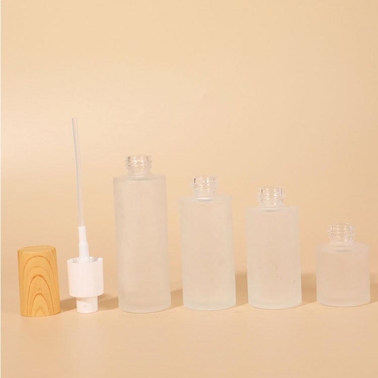 Portable clear 100ml refillable glass perfume dispensing bottles for travel