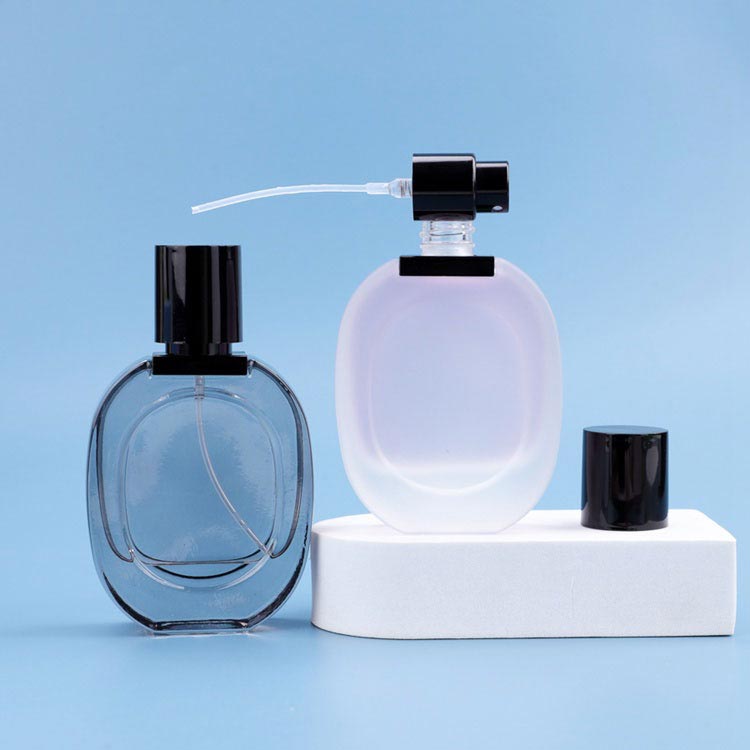 Hot selling small oval flat 30ml travel cosmetic bottle for perfume
