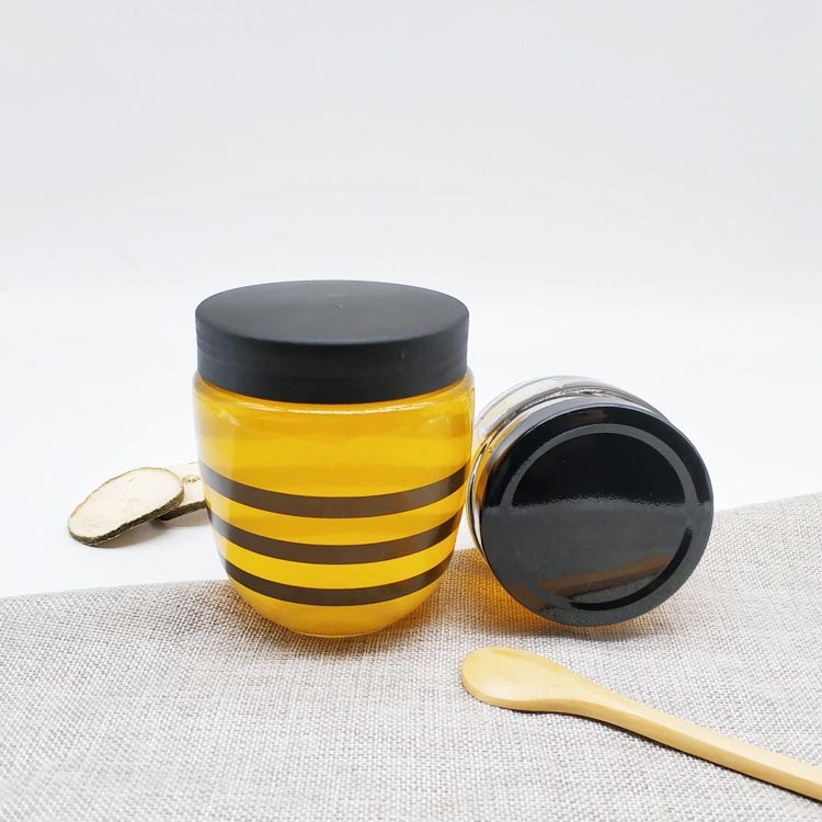 Unique design bee shaped 240ml 400ml glass honey storage jar with screw cap and dipper