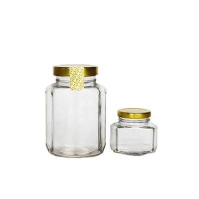 Hexagon Shape custom printing hexagon glass jars wholesale with tin lids for honey/candy