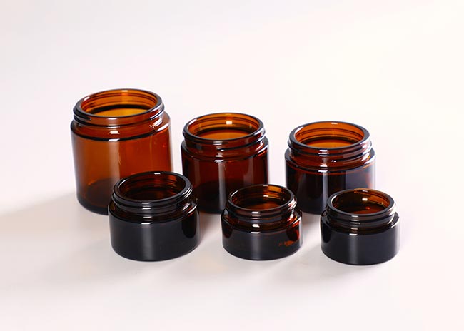 Luxury 15g amber cosmetic glass cream jars with lids for lotions
