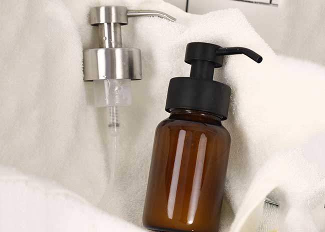 Refillable 250ml 380ml amber glass soap bottles with pump from lotion bottle supplier