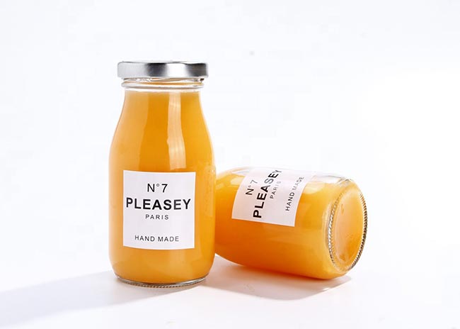 Wholesale clear 200ml glass juice drinking bottles with lids bulk