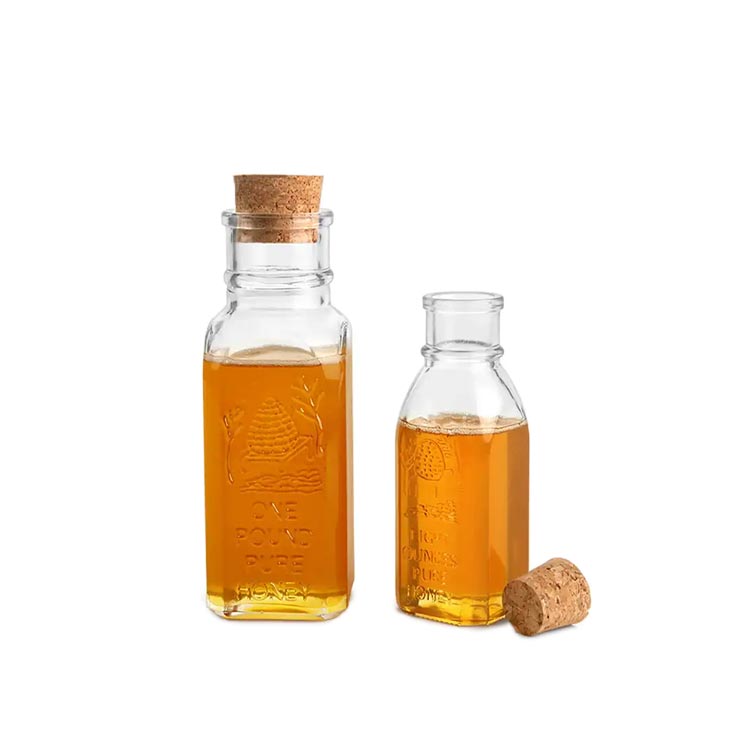 Wholesale clear 8oz 16oz glass muth honey jar with cork from factory